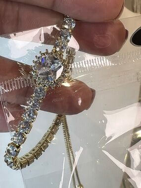 Gold Crystal Tennis Bracelet with Clear Center Stone